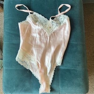 Vintage pink, with white lace nighty, no size but would fit a median best